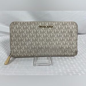 2063: Michael Kors MK Logo Zip Continental Wallet Vanilla Tan